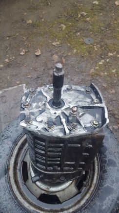 Spacer plate mounted to core transmission so grinding of face can take place, and the areas where the bolt heads rest are still the original height(needed to keep the bellhousing flush) and everything else on that side is below the bolt head locations.