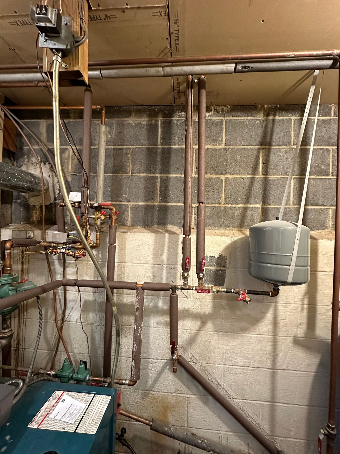 How can I flush my baseboard heating system