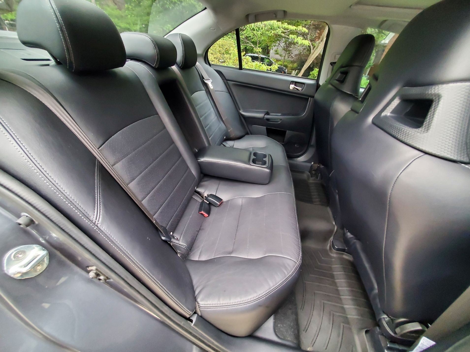 2010 Mitsubishi Lancer Evolution - 2010 Mitsubishi Lancer Evolution X MR Touring - Graphite Gray (Mostly Stock) - Used - VIN JA32W5FV0au030566 - 65,909 Miles - 4 cyl - AWD - Automatic - Sedan - Gray - Charlotte, NC 28209, United States