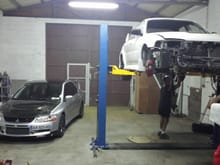 my evo and evo 4 in my brother's garage