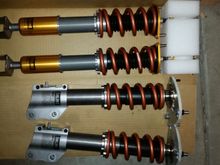 Ohlins DFV with swift 12/14k springs and custom valving. Ciroracing caster plates