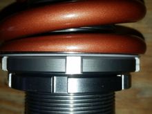 Thrust washers installed on front coil-overs only.