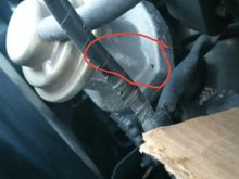 Pick a side one or other as long as it's flat. If you drill on rounded edge, it will be tougher to tap for nipple.