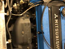 With heat shield. Runs good!