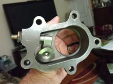 After: note the lever is much closer to the cast housing, has been rotated 90° (facing the camera), and the actuator arm attachment nipple has been shortened as well.