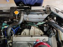 Remove the drivers side radiator fan and shroud