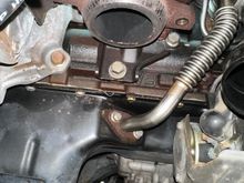 O2 housing bracket with bolt visible