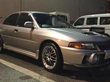 Sanded down the bumper lip and painted it silver black to match the trunk