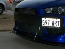 Front with installed RRM carbon fiber grill, bumper cap, and front splitter