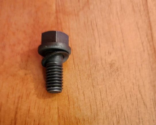 Pressure plate bolt with sprung (conical) lock washer. 