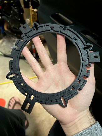 Mounting ring with three tabs that needed to be cut off