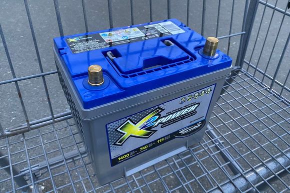 X2Power (on a shopping cart) on the way to recycling.