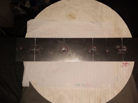 This is a 20G 16" x 3" piece of SS. I made my own measurements because i wanted it longer. The placement measurements are specific to this plate, but if you want them just ask