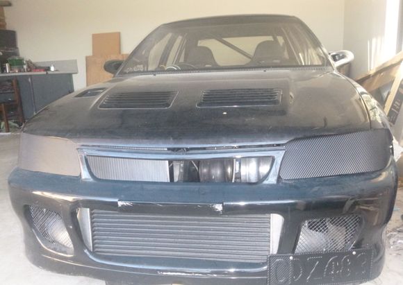 Sneak peak of the Borg Warner S371 turbo with race cover. Coupled with Turbosmart 50mm Pro Gate.