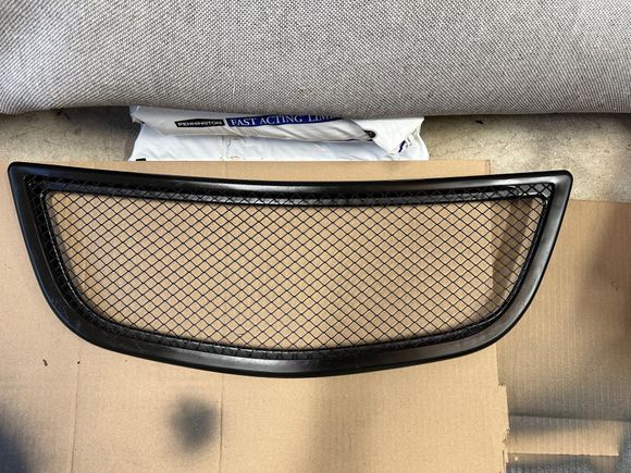 Hood vent with rubber surround