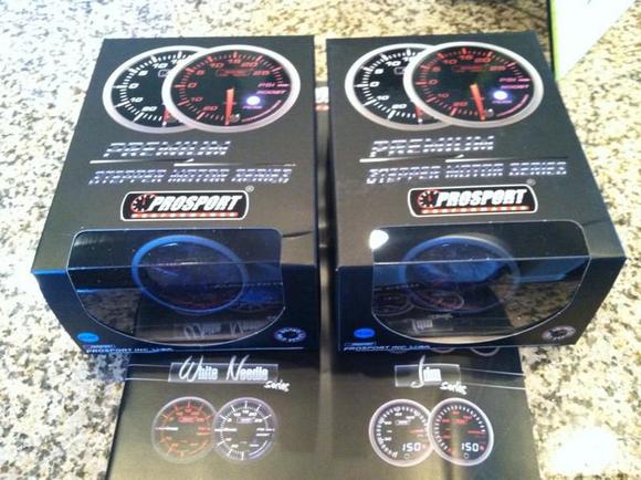 Prosport Boost and Oil Pressure. Halo Series, these along with an AEM UEGO Wideband will fill out the ATI triple dash pod.