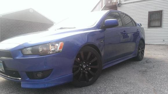 Corner look of newly painted wheels and Center caps.