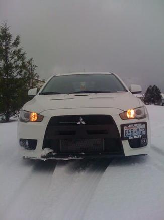 Evo X can still drive on snow even with the stock rubb 
er... S-AWC