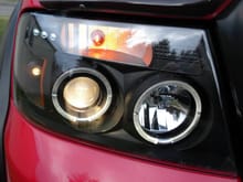 Kevin's F-150 Halos with HID and LED passenger side