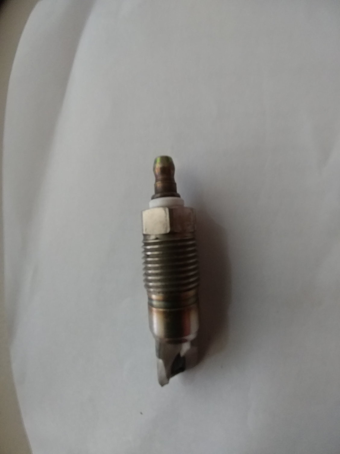 ceramic broken off sparkplug electrode