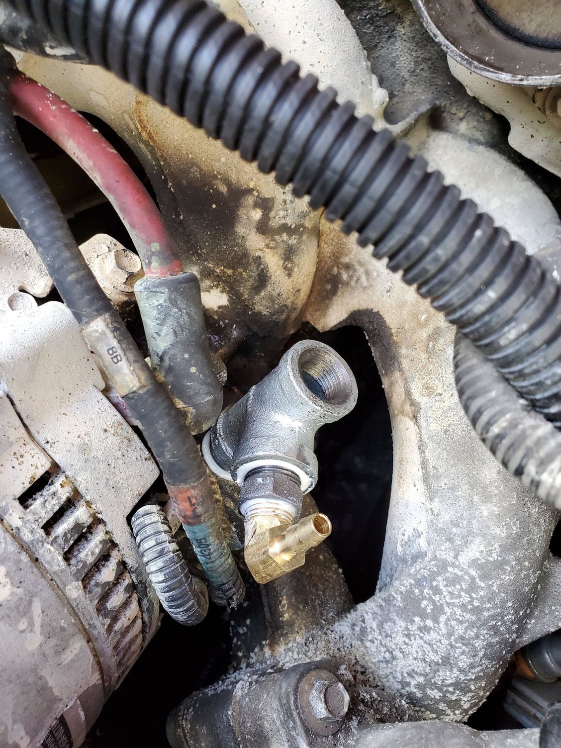 Need help IDing part 1998 F150 5.4L coolant leak from pinhole in tube