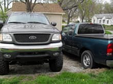 Interior Image 
My truck next to the neighbors stock f150 just a little bigger than his.