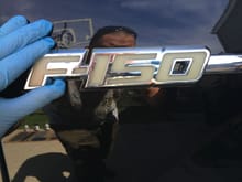 This was off my 2012 F-150. Recon LED emblem. I removed the back with the white led's. I will be replacing them with black light led's. In the next photo shows the end result of smoking the inside and painting the outside piece.