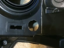 I drilled out this hole to push the wiring through for the shroud, halo, and demon eyes.