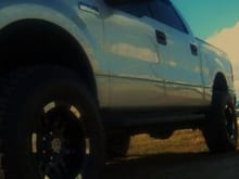 2nd truck- 04 f150 4x4. got it stock did 3'' leveling kit and 3'' body and 35s with moto metal 951s--SOLD IT