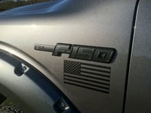 Painted badge and American Flag decal
