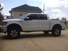 When I bought it...leveled on 295/70/18 Nitto Trail Grapplers