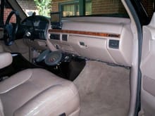 Eddie Buaer leather seats and leather door panels with wood grain trim all off a 96 Eddie Bauer Bronco.  Pioneer Avic-N3 Touch Screen DVD/Navigation System and Custom Fiberglass center console holding Focal 165K2P Components with High Competition Focal Tweeters.