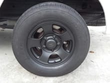 Plasti-dipped wheels..have since repainted with black wheel paint/ clear coat