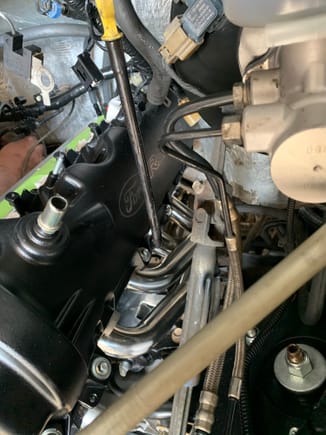 Picture of it in the truck with new motor mounts. Both of the old mounts were broken...  the clearance on the headers were tight. Man am I glad we put those on before we dropped the engine in.  I used arp bolts on those so they would hopefully not stretch with the heat...