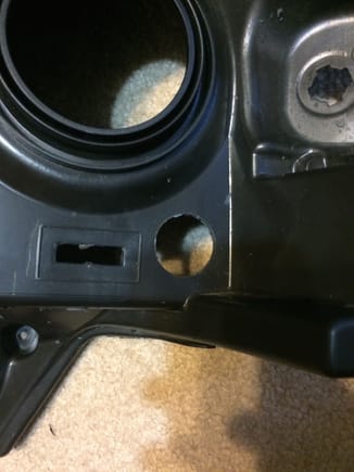 I drilled out this hole to push the wiring through for the shroud, halo, and demon eyes.