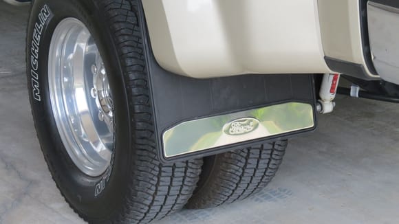 Ford factory parts mud flaps.