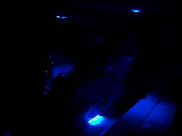 Blue LED's mounted behind center counsle in rear seat