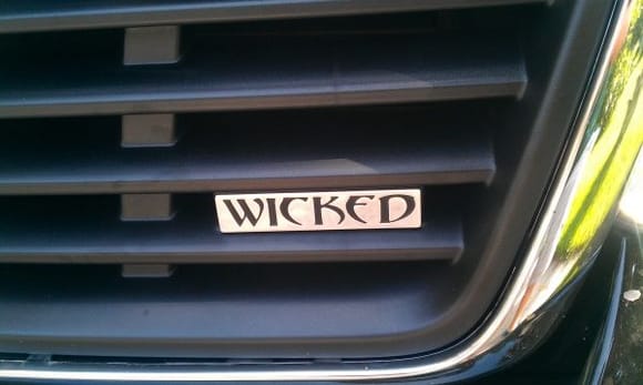 wicked badge installed close up