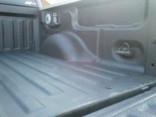 Reese 15' Retractable cable lock with Master Lock Bed locks on each side.