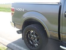 Banks exhaust, fender flares, tinted tail lights