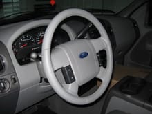 Factory leather steering wheel installed in place of the urethane one that comes stock on the XLT trucks.