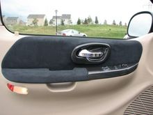 New suede on doors with chrome handles.