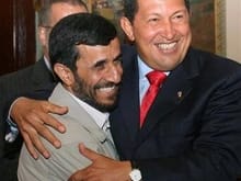 venezuelan president hugo chavez greets  iranian president mahmoud ahmadinejad