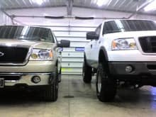 dads stock 07 f150 4x4 next to my 06 f150 4x4 after the 6&quot; suspension lift and 35s