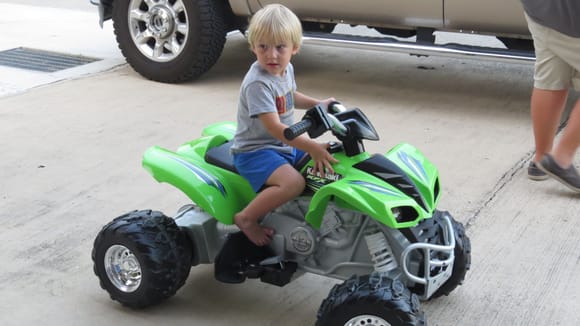 My 2-1/2 yr old grandson with his new toy.