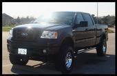 6" Pro-Comp suspension
35x12.50x17 Pro-Comp X-treme All terrains
Volant Cold Air Intake
Fitch Fuel Catalyst
Cherrybomb exhaust SI/DO dump dualed out the back
Bushwacker Pocket style fender flares (not shown)
35% tint on front
20% on back
1200 watt Nitro amp
2 10" Kicker CVT's
4 Pioneer 6x8 door speakers
Kenwood in dash screen with navigation
Chrome Tractor Supply tool box