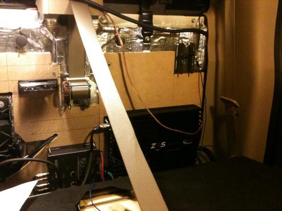 Drivers side with Grounding block (grounded to middle-left seat bolt), LC6i and Cadence mono amp