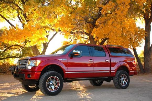 Fabtech 4-inch Suspension System with Nitto Trail Grappler MTs 295/60R20 (34-inches tall) mounted on Moto Metal 961 Wheels ( 18mm Offset, 5.71" BS) with PTM Inserts.