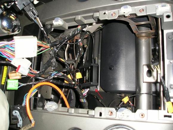 A look behind HVAC/HU area. This is where I put the "Media Gateway" that you plug your HD Radio/Ipod cord into, then it goes back to the HU