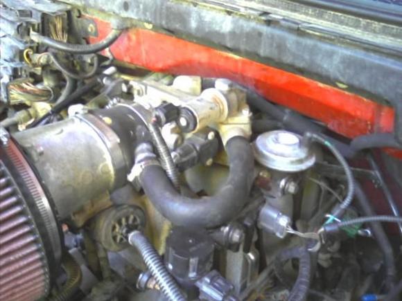 i fixed my IAC i got a plastic barb and put a hole in the rubber cupling from the Thorttle body to the MAF silconed the barb in there and put the tube back on. my truck starts right up no more surgeing :)